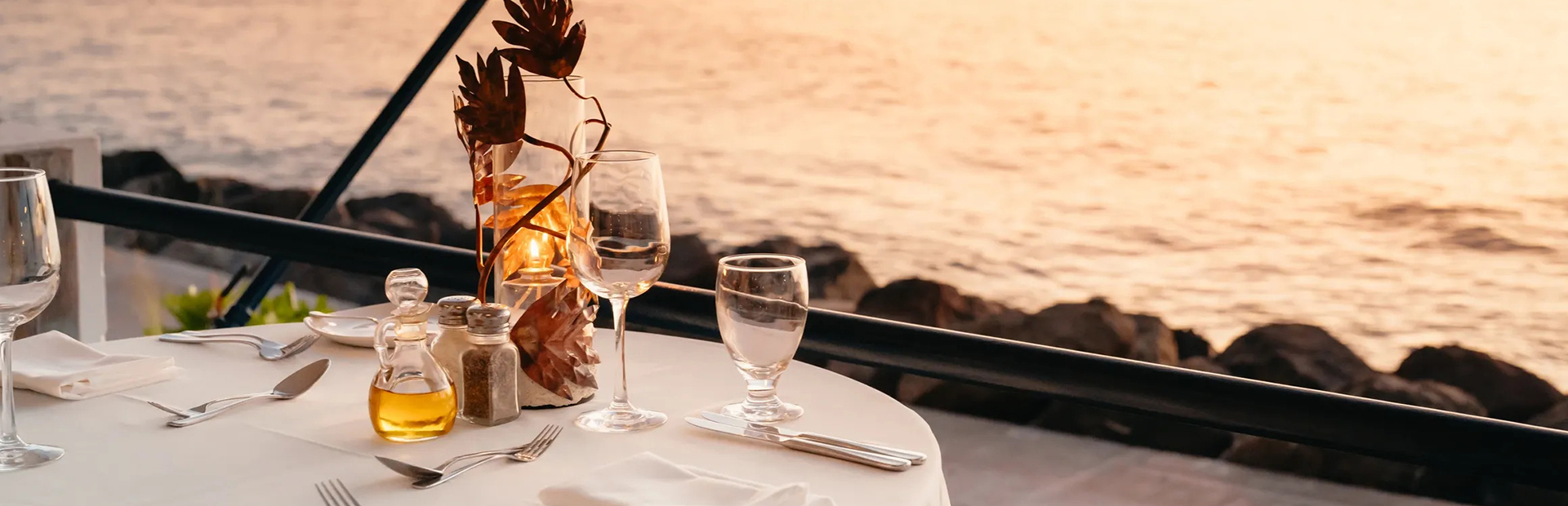 Sunset dinner table setting at Boardwalk restaurant in Barbados